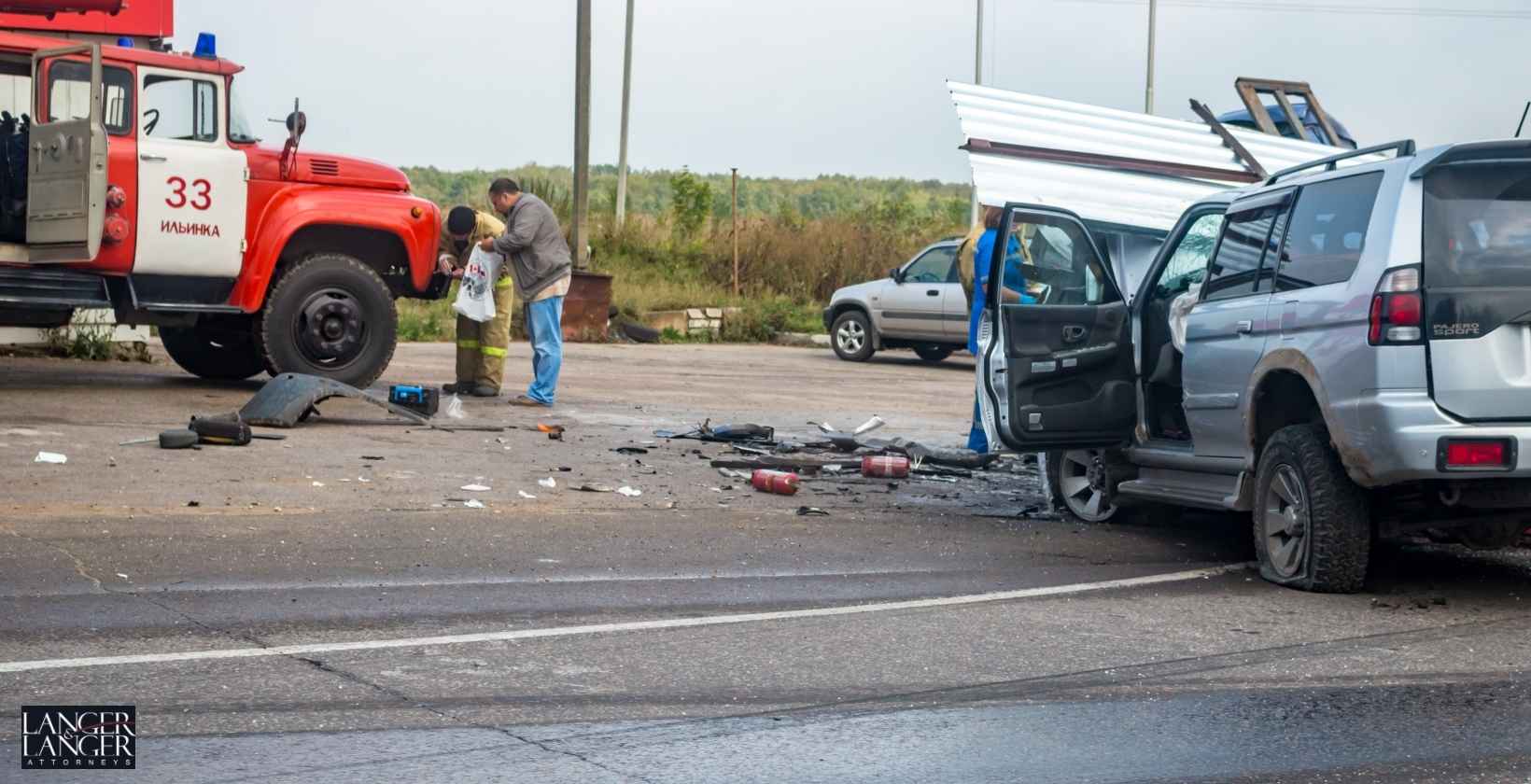 One Dead After Dump Truck and Van Collide