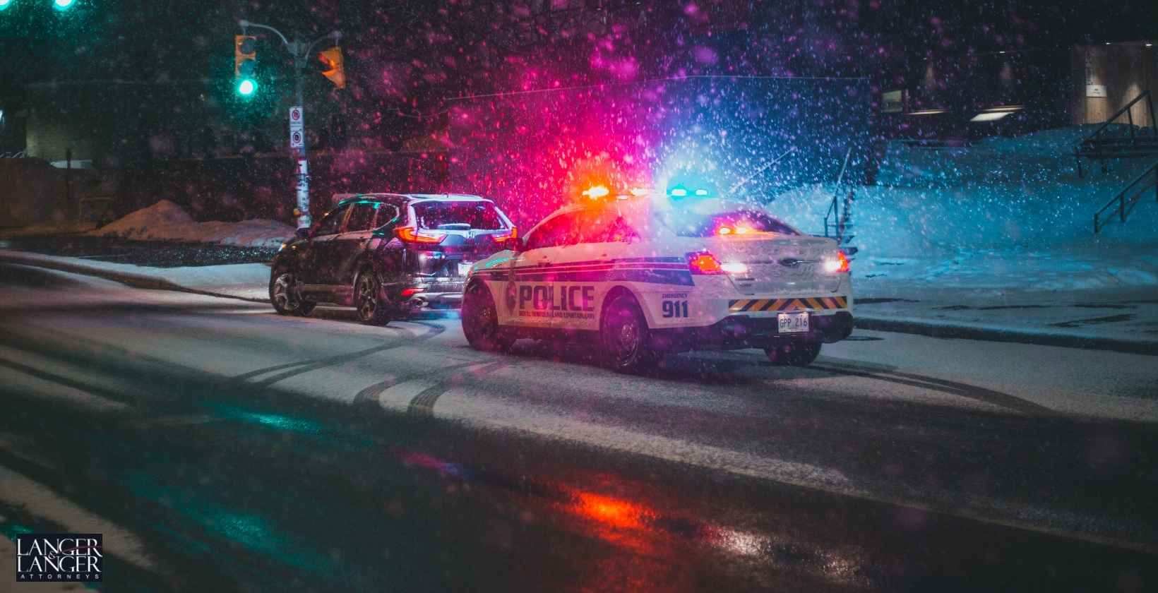 Officer Hospitalized After Squad Car Strikes Parked Vehicle